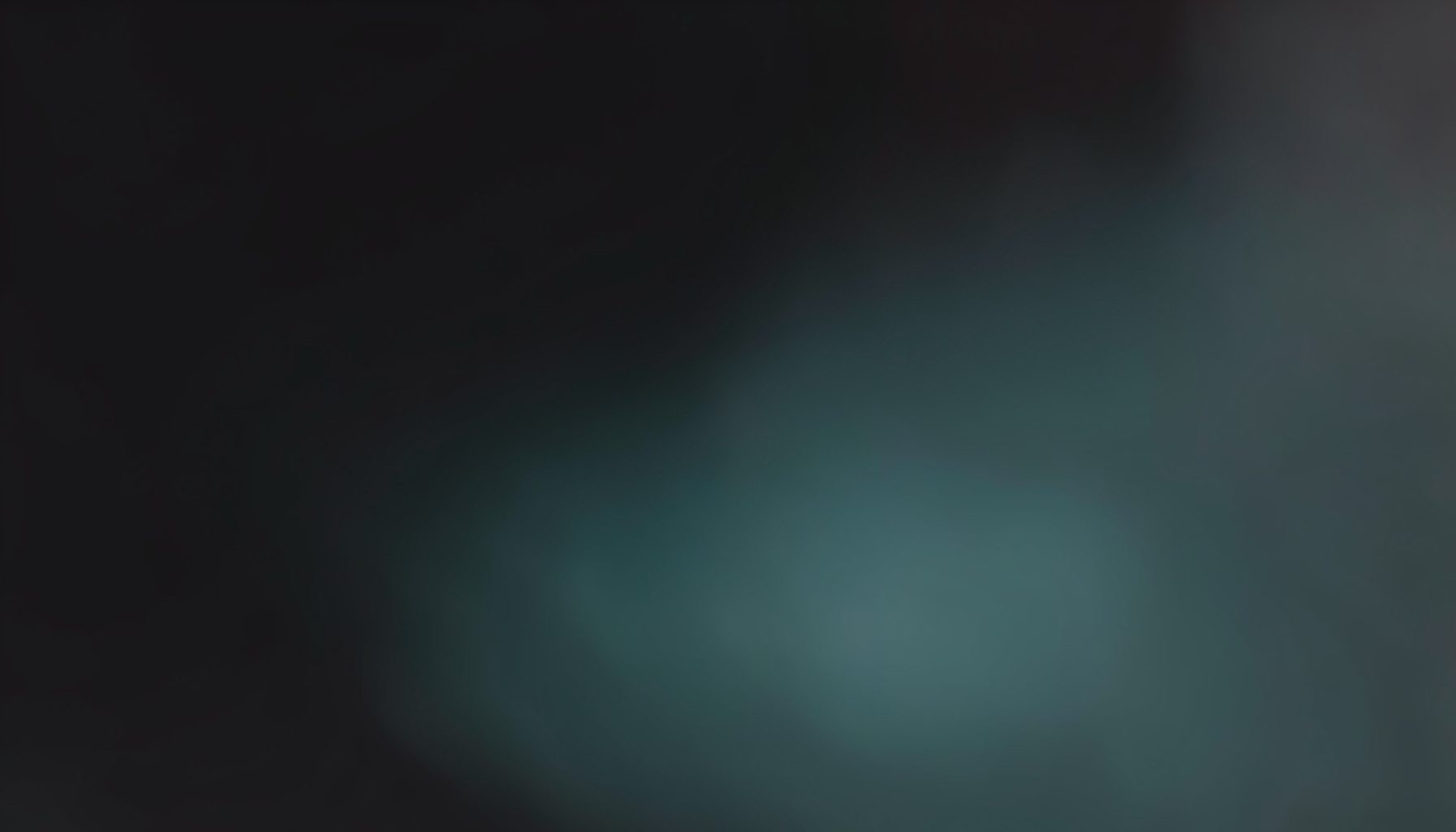 A dark abstract gradient composition with deep charcoal and muted teal tones, no figures or objects